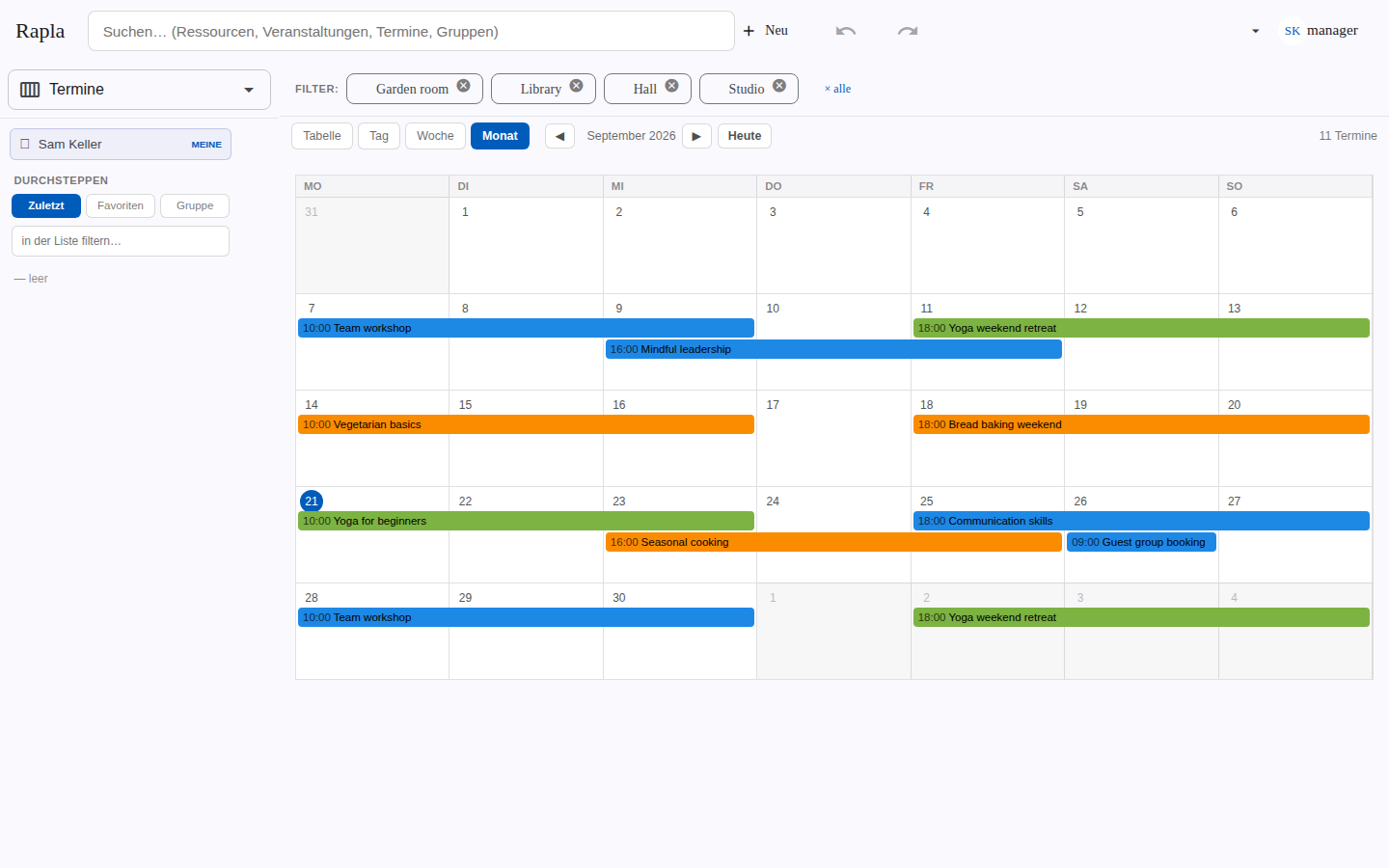 Month grid with multi-day seminars coloured by kind